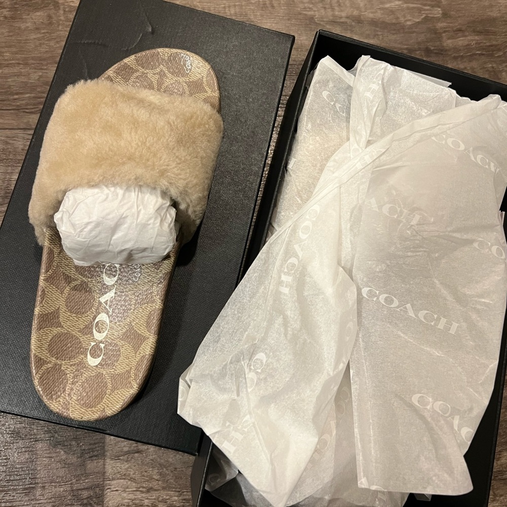 Authentic coach slip ons.